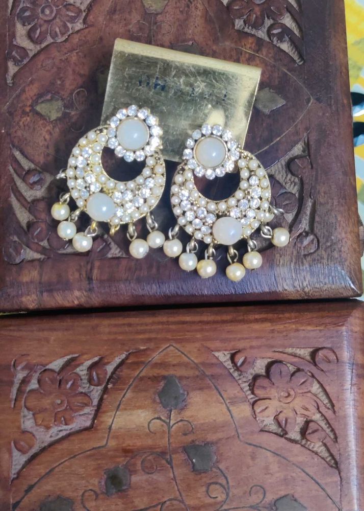 Traditional Earrings With Pearl Design