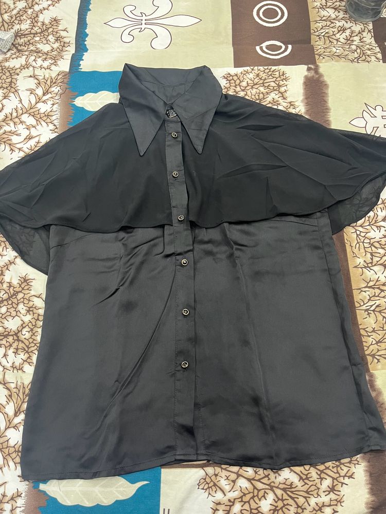 Black sleeveless satin shirt