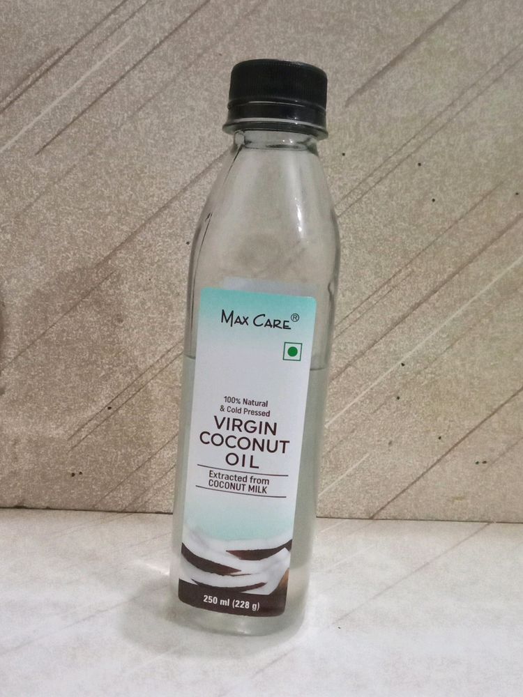 💯% Natural Maxcare Virgin Coconut Oil.