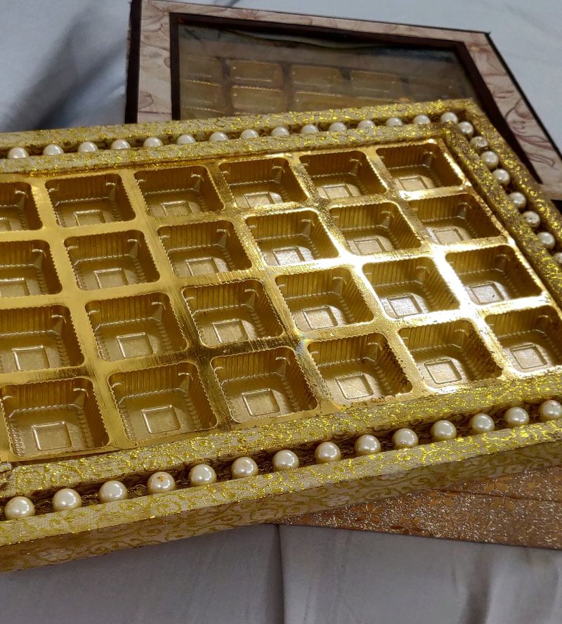 A SET OF 3 WOODEN PACKING TRAYS