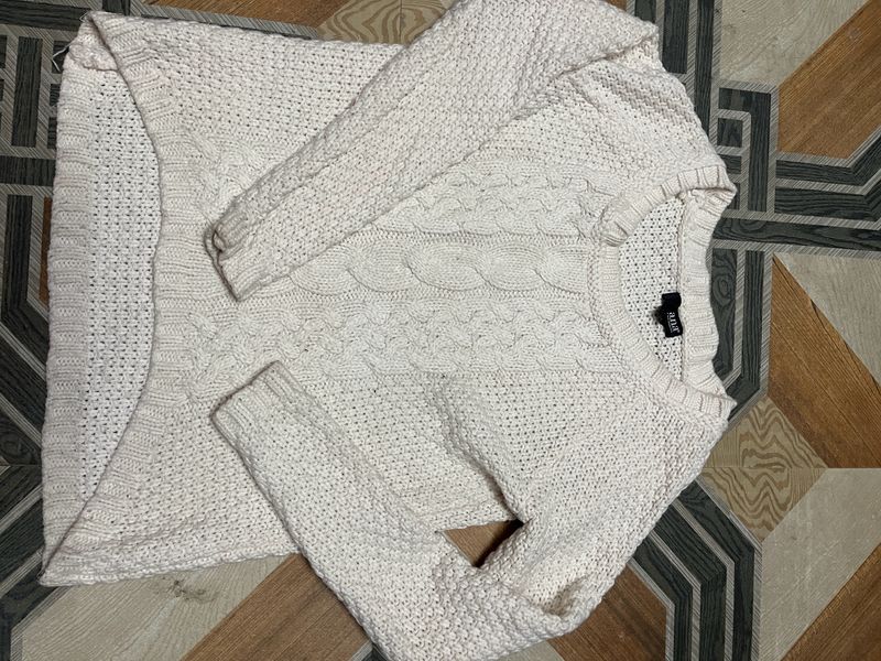 white wool sweater