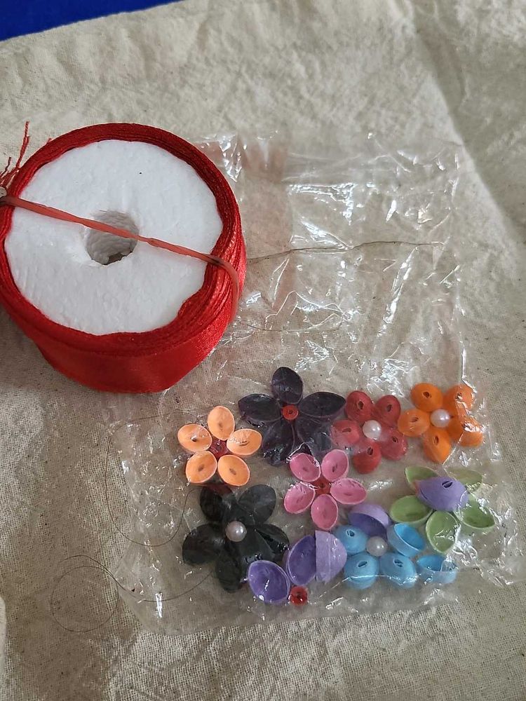 Quilling And Red Ribbon For Craft