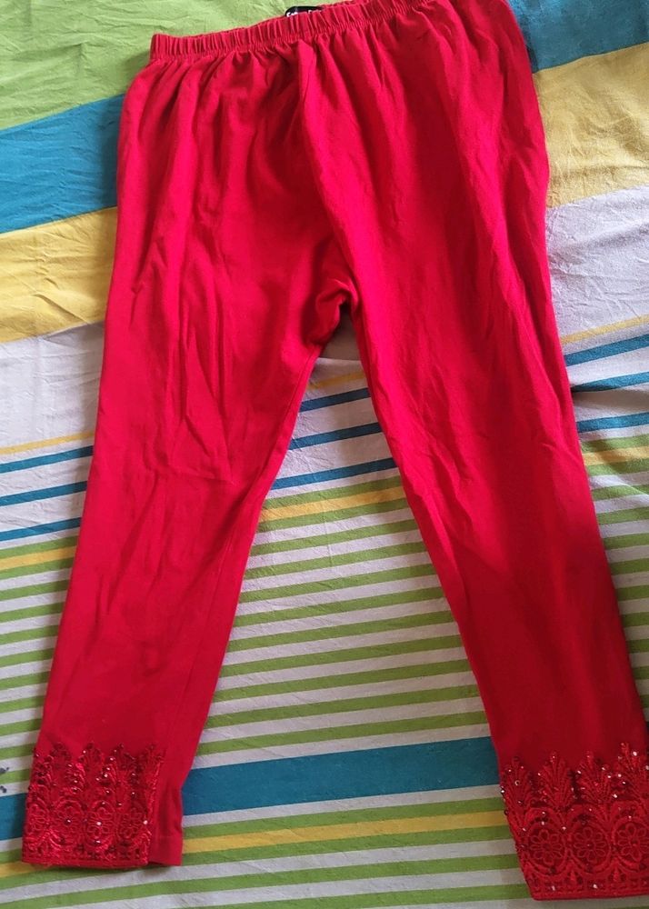 Red Leggings A Little Below Knee Length With Work