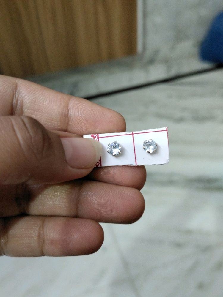 Like New Earing And It's  Pure Silver