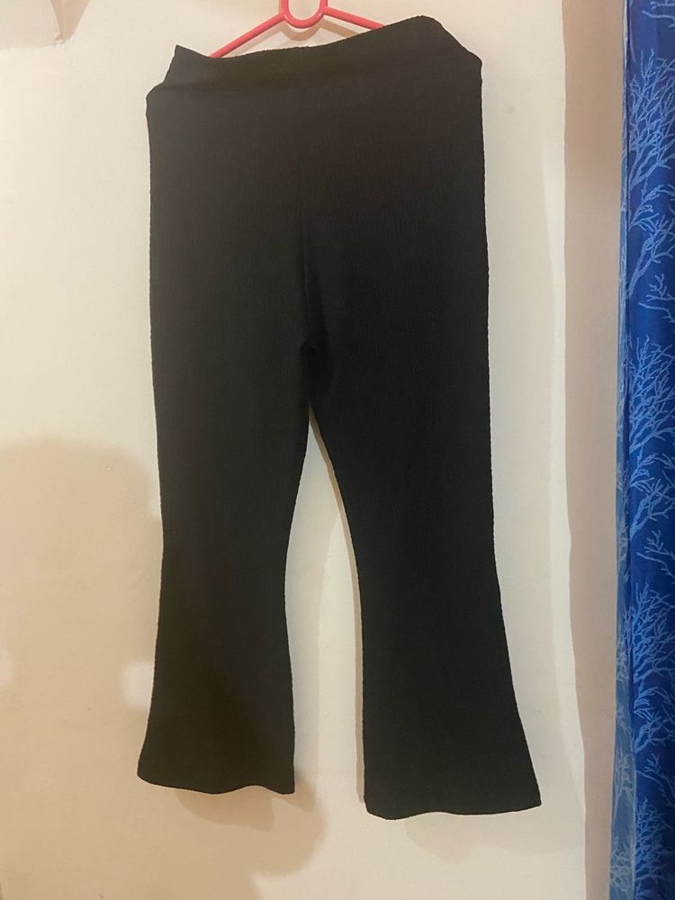 Black flared pant by ginger