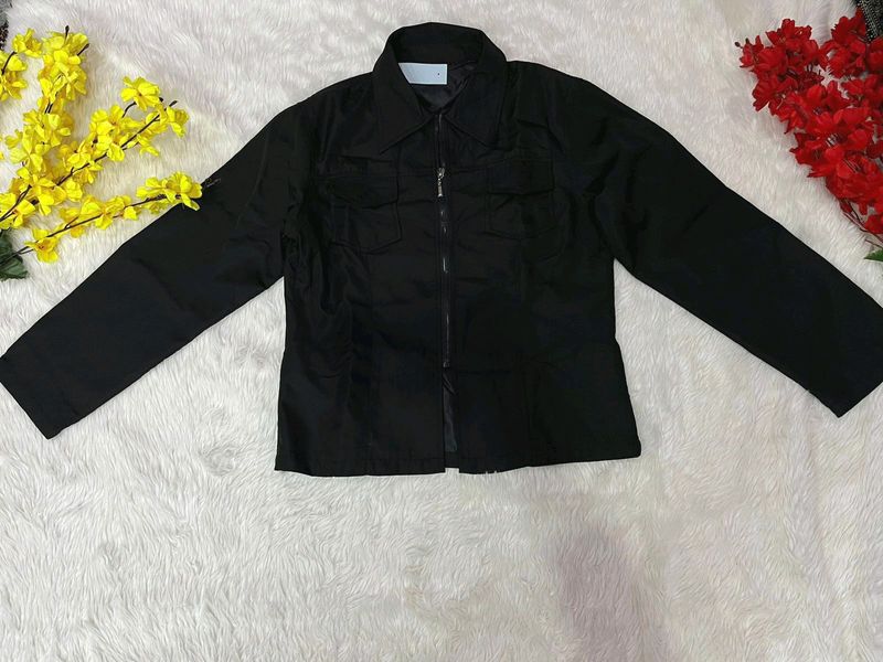 Black jacket with half chain fromt opening