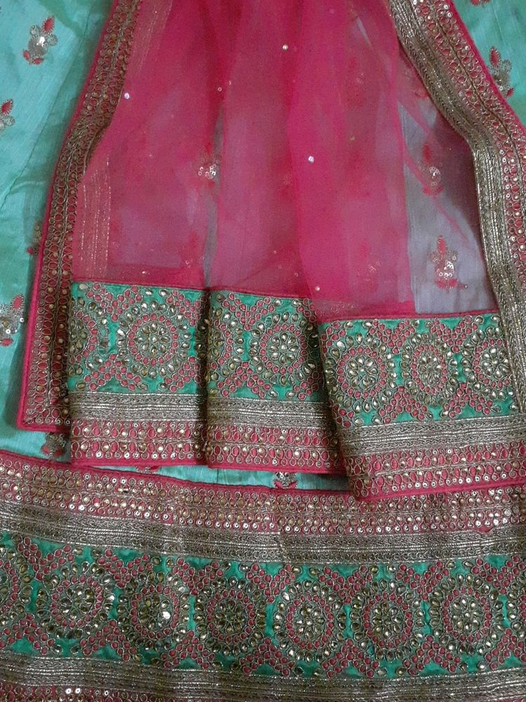 Pista Green Pink Bridal Lehenga Semi Stitched