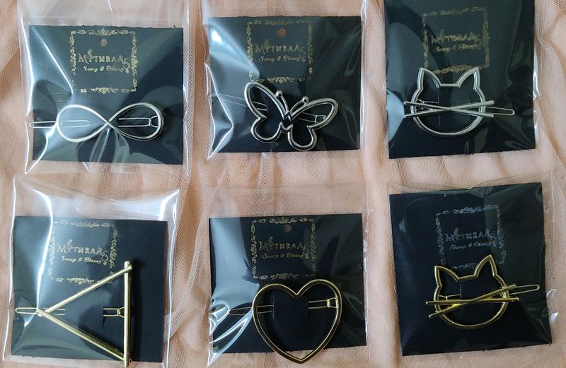 BRAND NEW KOREAN CLIPS. GOLD (1) AND SILVER(1) PINS IN A PACK