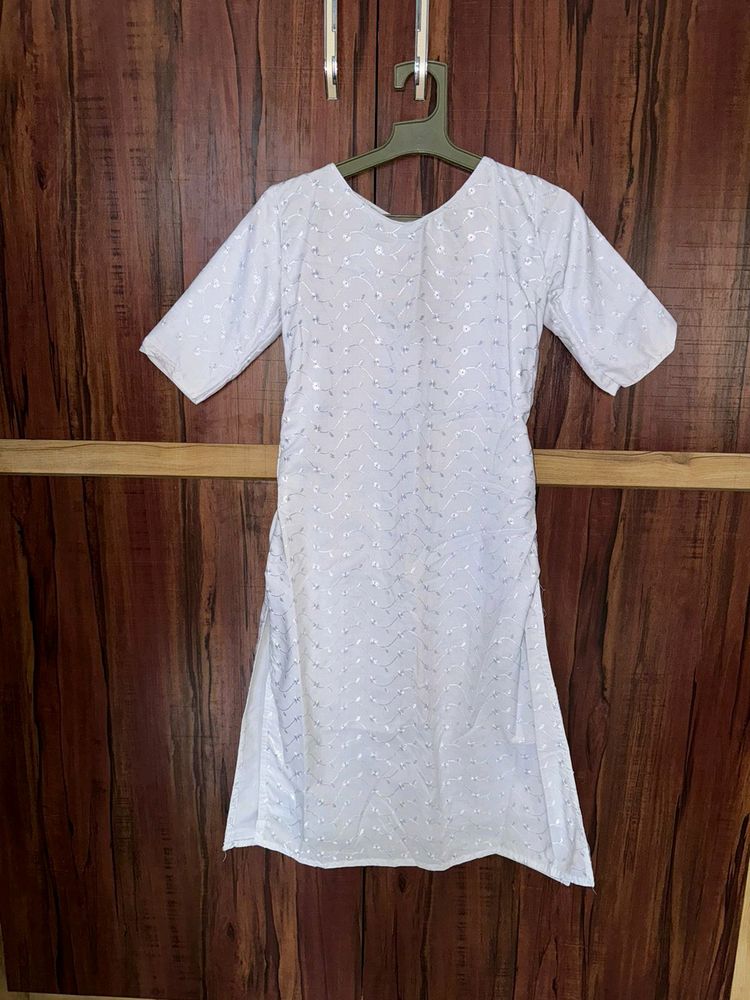 White coloured Stitched with floral Printed kurti.