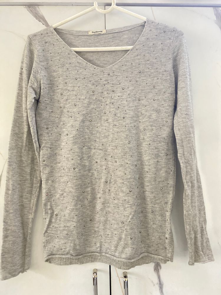 grey top with silver studs