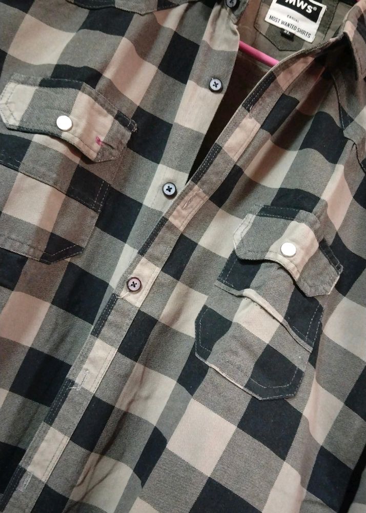 A Checkered Black And white Shirt With Full Sleeve