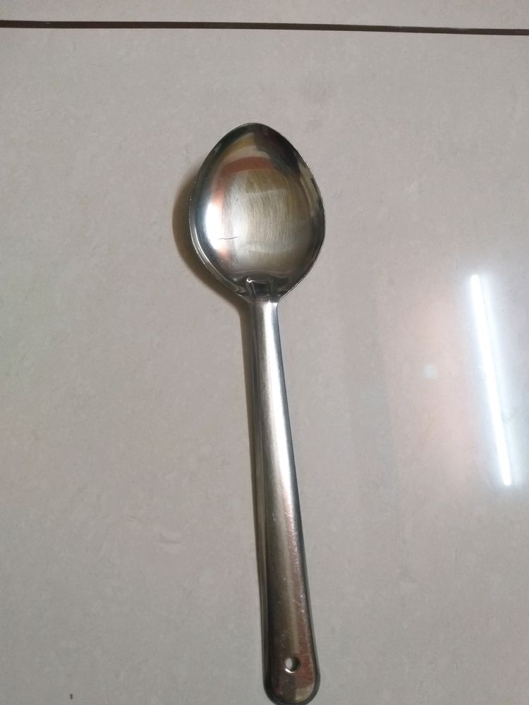 big kitchen spoon for serving food