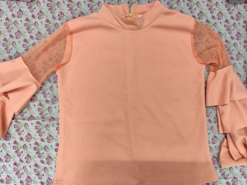 A Peach Trendy Top With Frills Sleeves