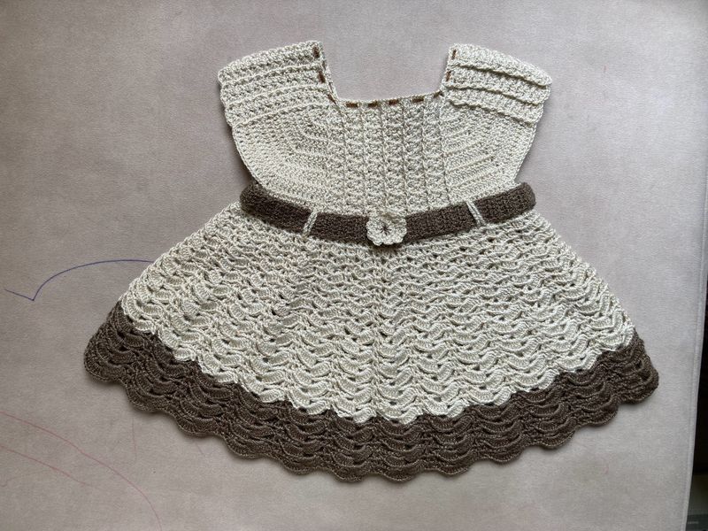 A Beautiful Crochet Dress For Baby Girl