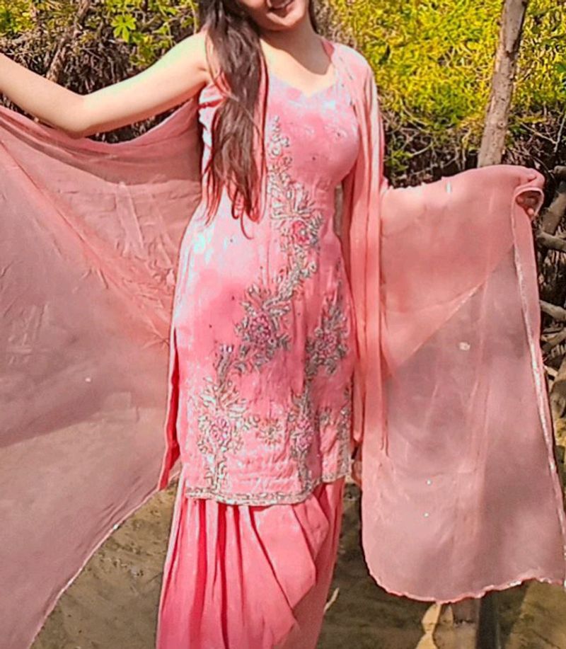 A Pink Colour Suit With Chnri