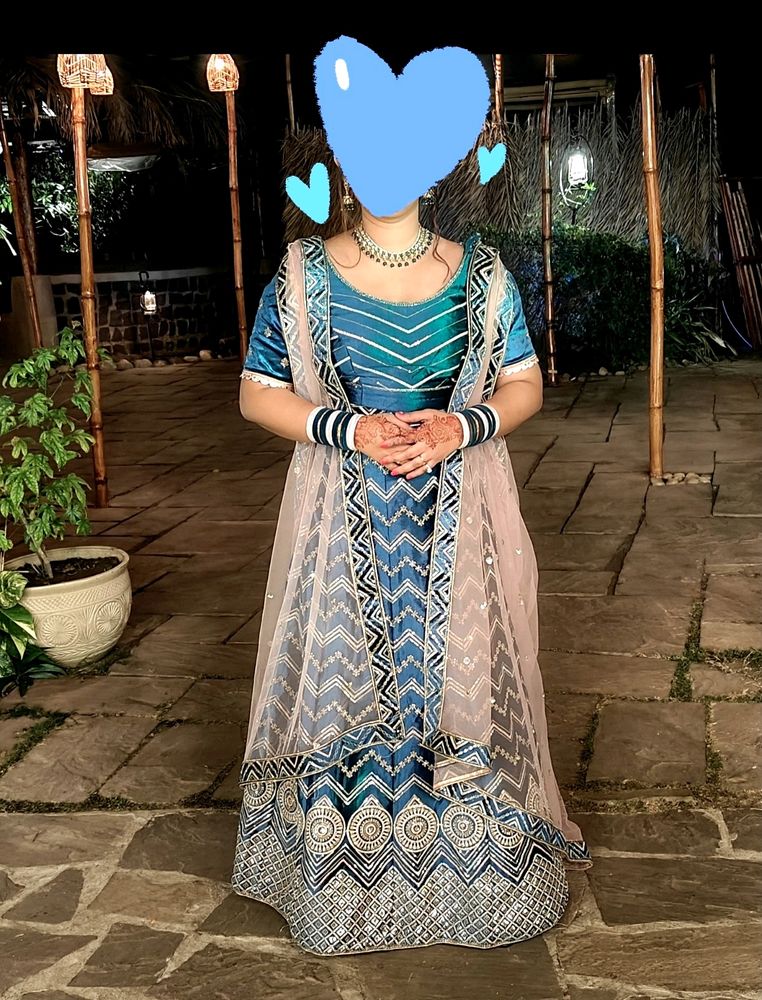 Peacock Blue And Peach Lehenga