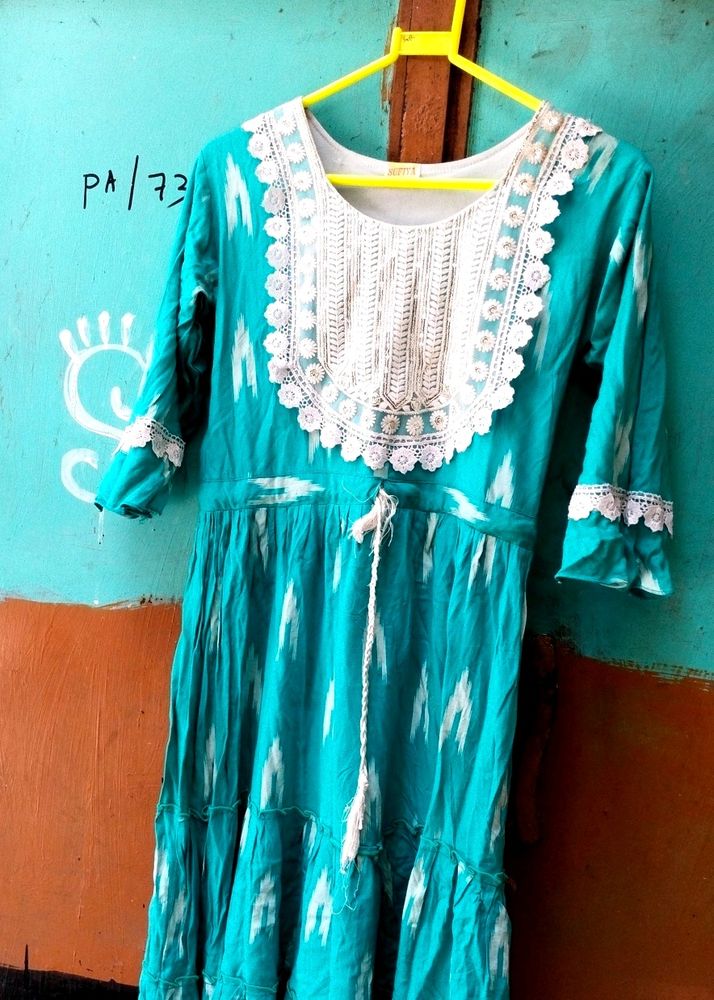 A Beautiful Kurti With White Embroidery Work