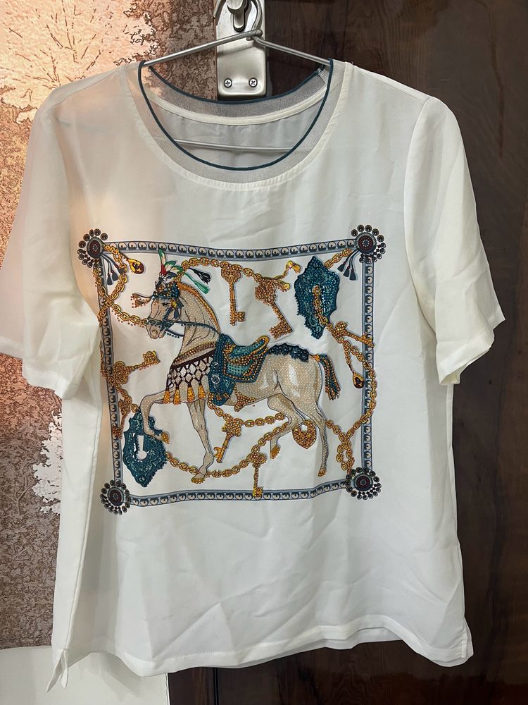 trendy horse print top