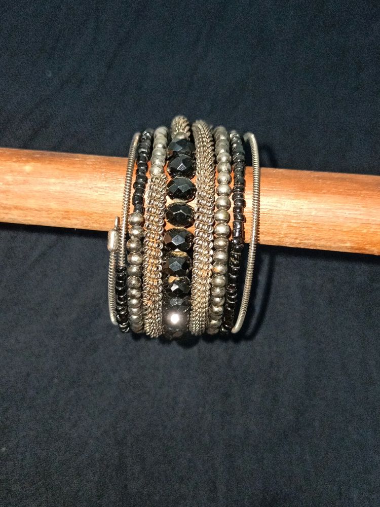 Bracelet... Black And Silver Colour