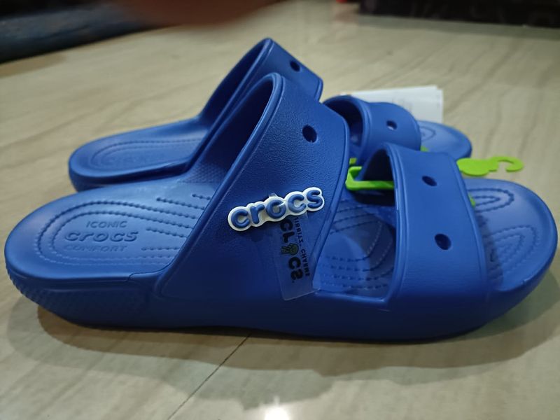 Crocs Classic Blue Sliders.