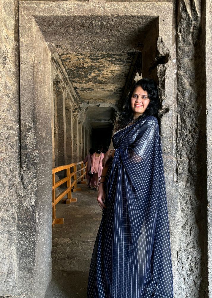 Navy blue slil saree with silver blouse