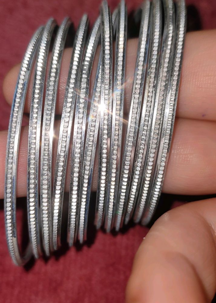 Silver and Grey Metal Bangles