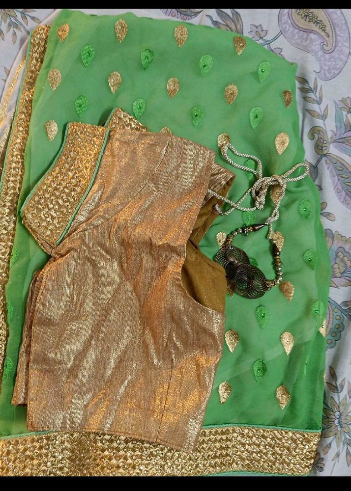 Cream And Green Heavy Work Saree With Blouse