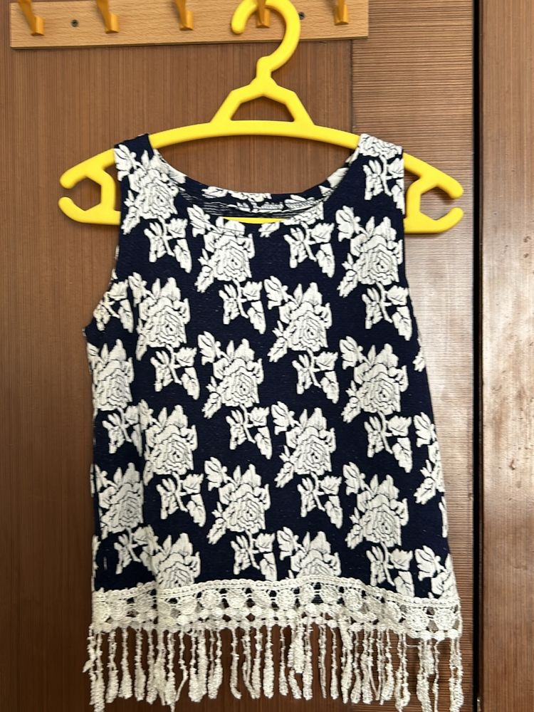 Sleeveless Top With Hanging Design