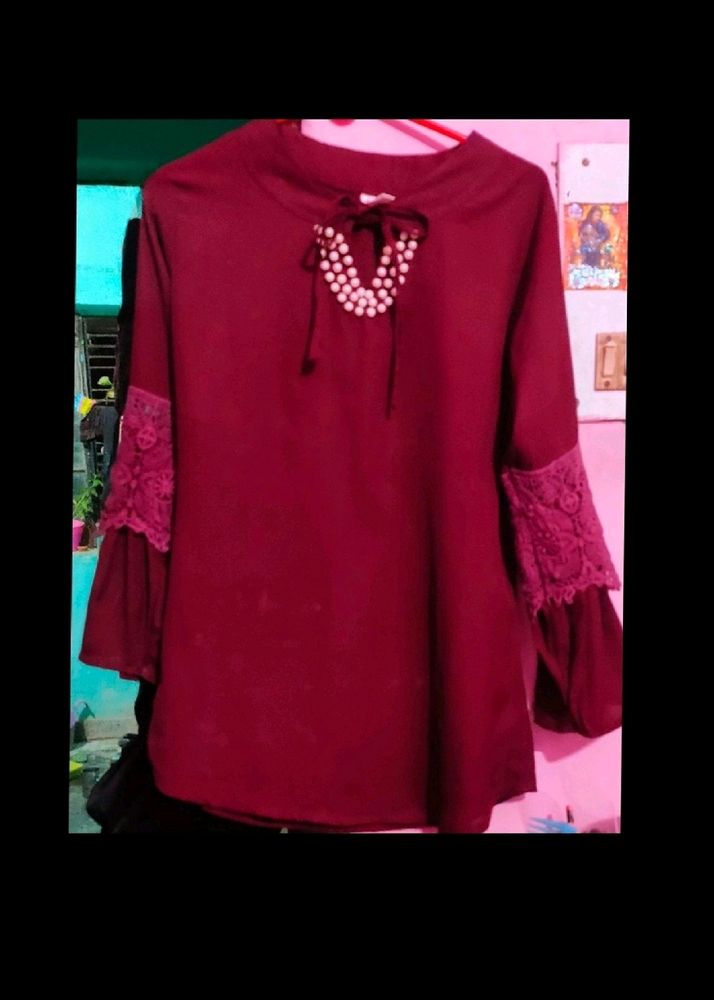 Beautiful Top With Pearl Neck And Stylish Sleeves