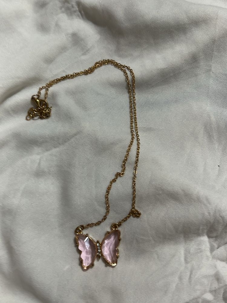 Pink Butterfly Pendant Along With Chain Attached