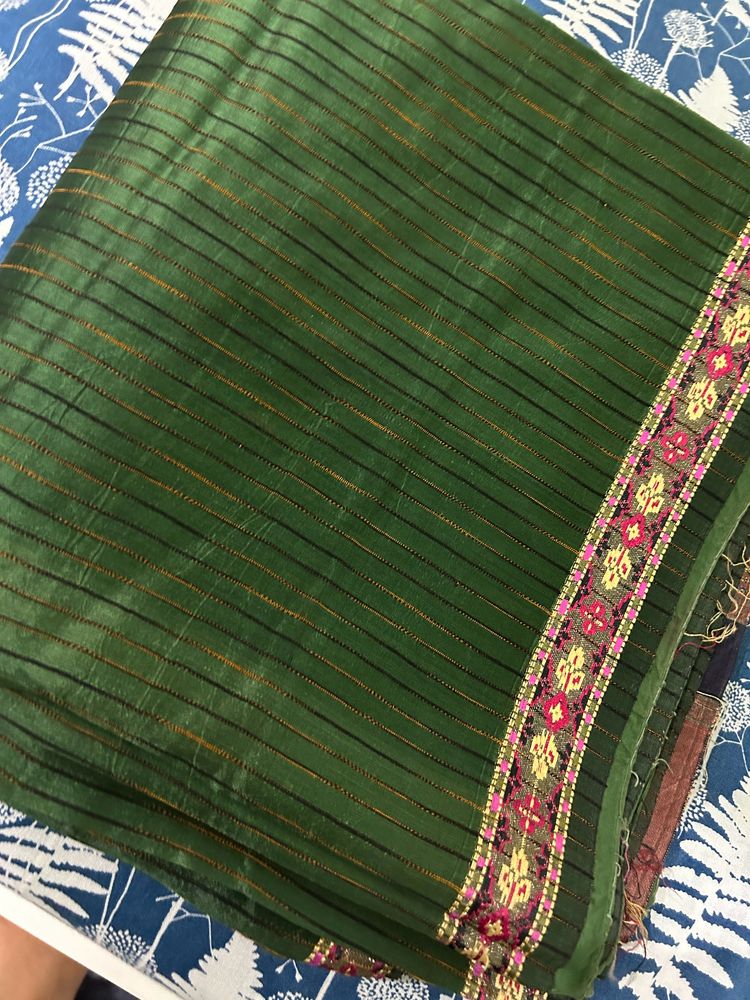 a butiful saree with sober design