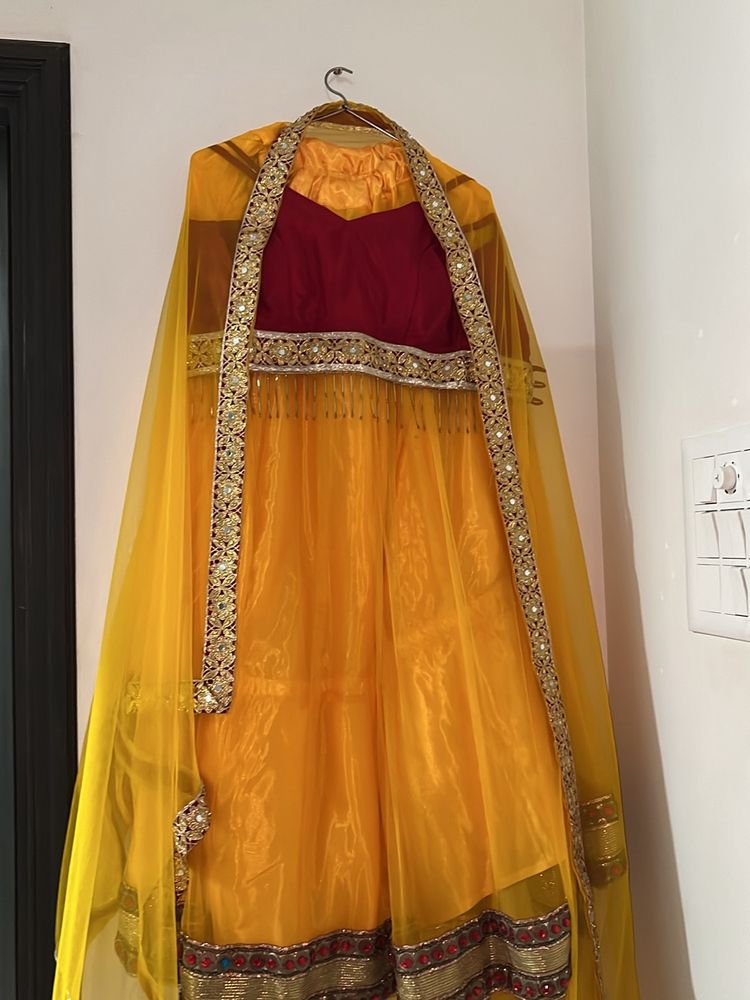 Yellow Lehenga With Beautiful Red Blouse