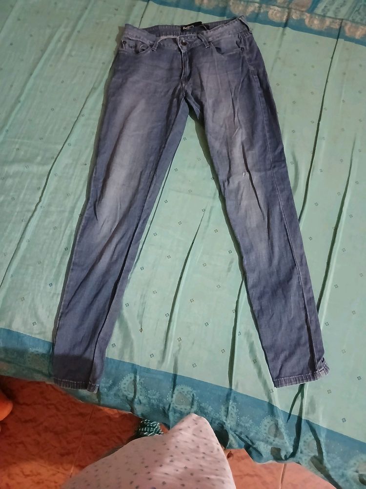 Ladies Jeans Slightly Torned