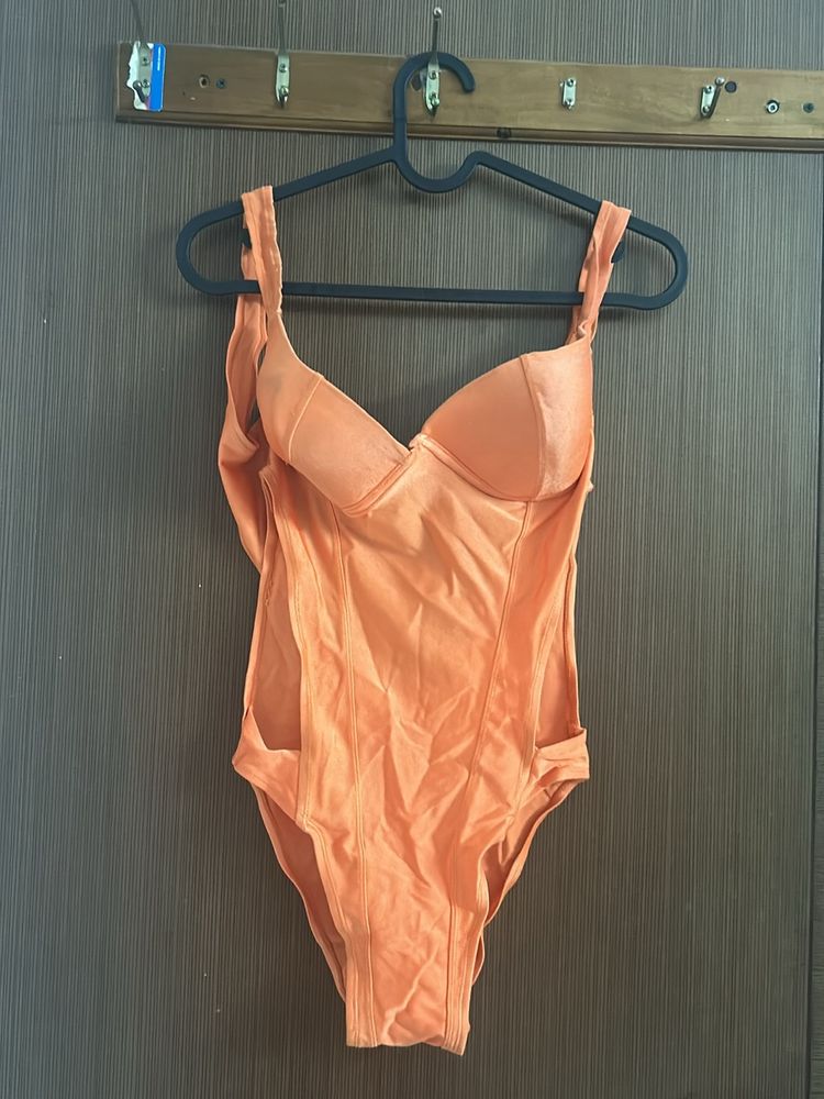 Pretty Padded Orange Trikini With Side Cuts