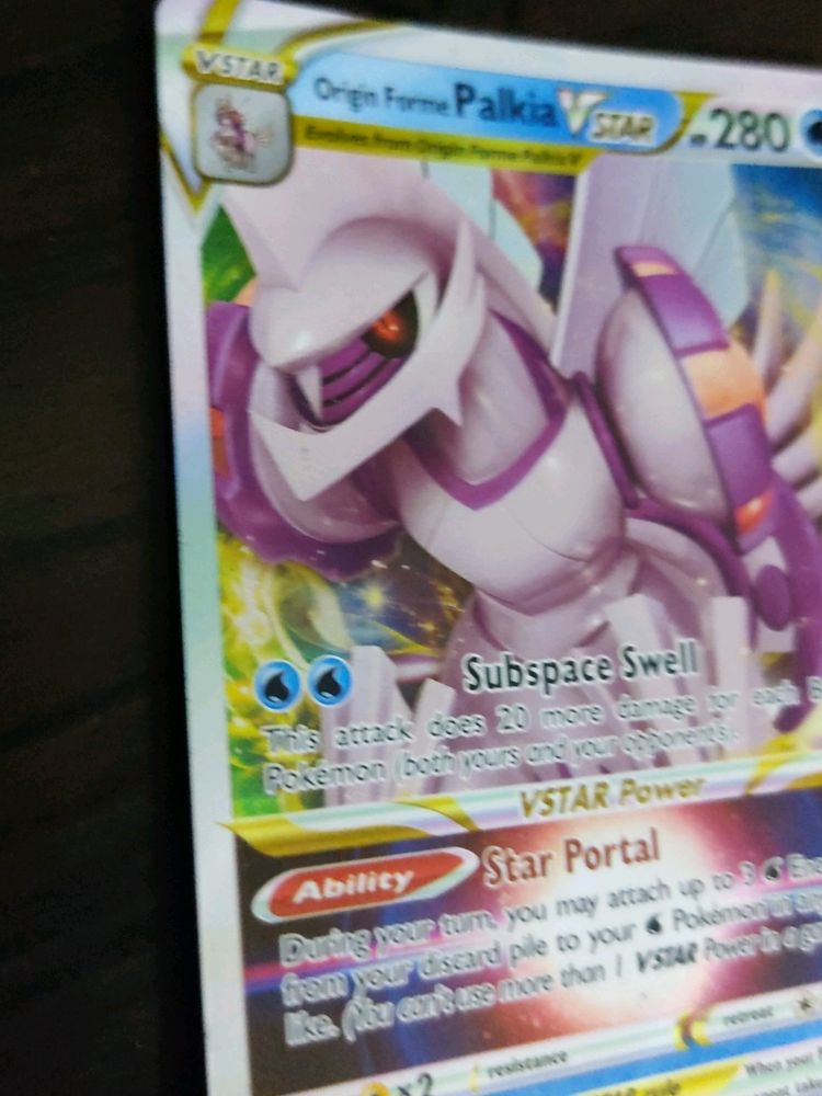 Rare Palkia Vstar Card With Dark Background