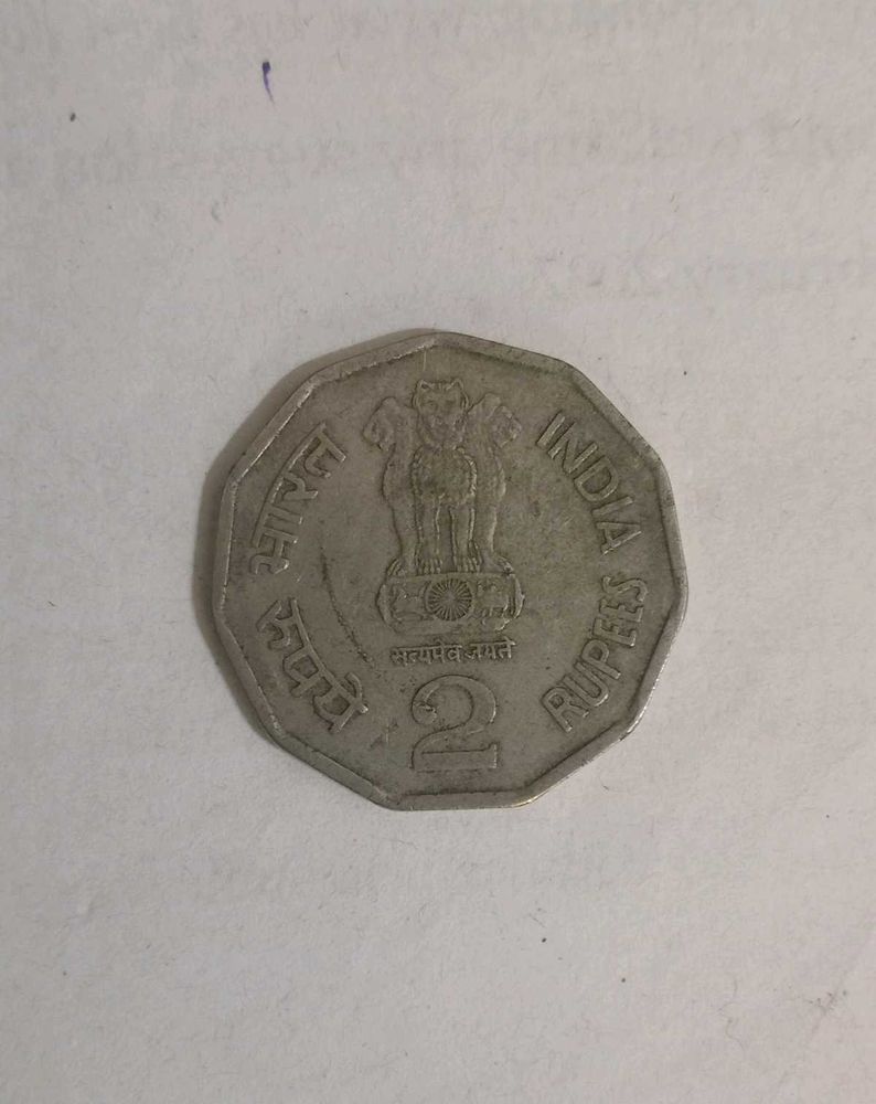 Old 2 Ruppe Coin With Indian Map Printed On It..