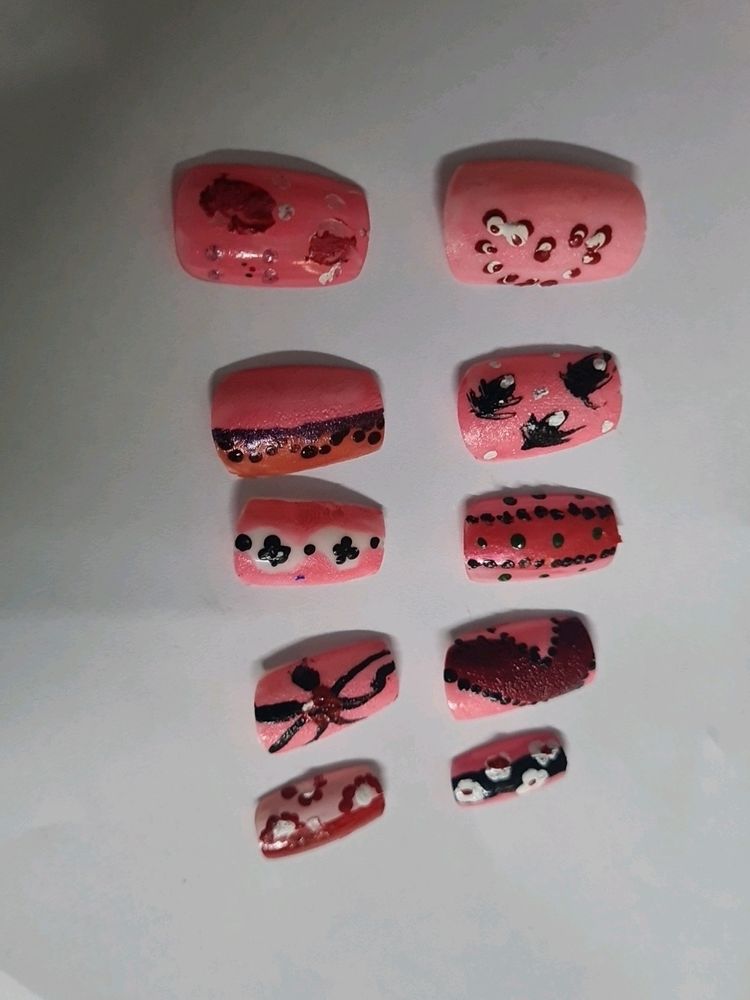 Pink Colour Artificial Nails Is Available.