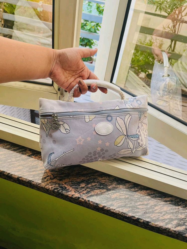 Longchamp floral Pouch