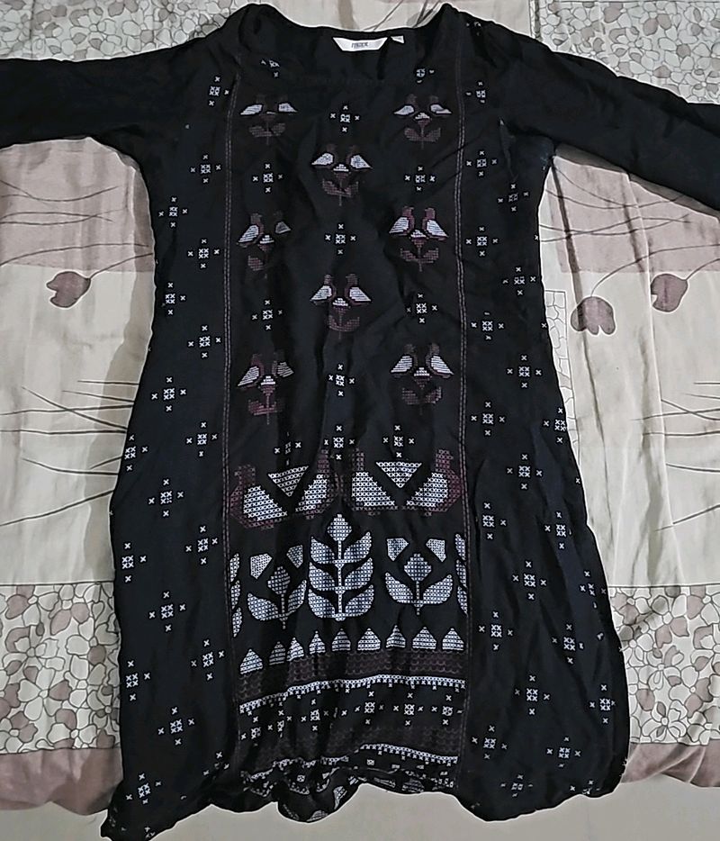 Its Black Top With Red And White Patterns