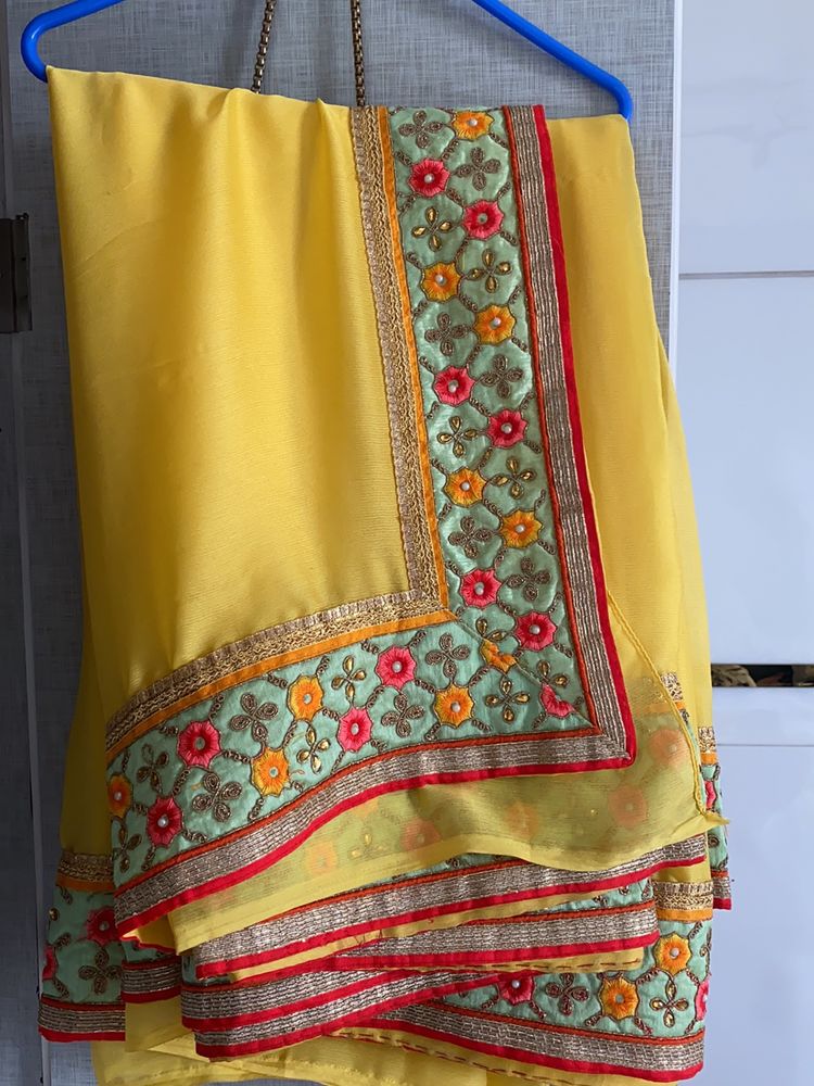 Yellow Saree With Full Border Work