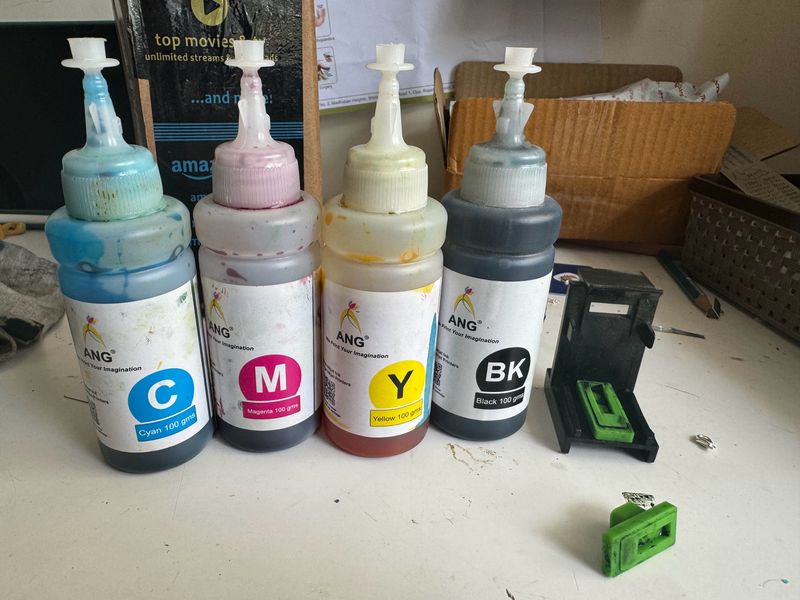 AGN ink bottles with suction machine