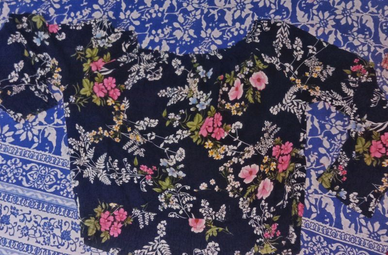 a blue floral printed stretchable crop top party