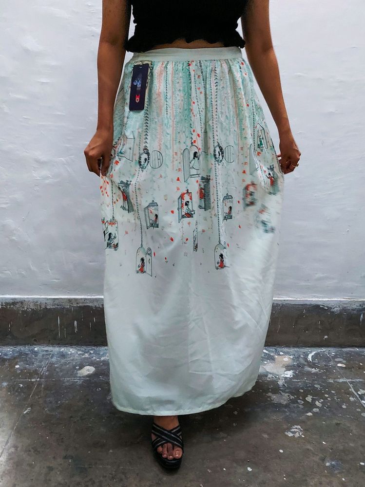 CHUMBAK off-white and green printed maxi skirt