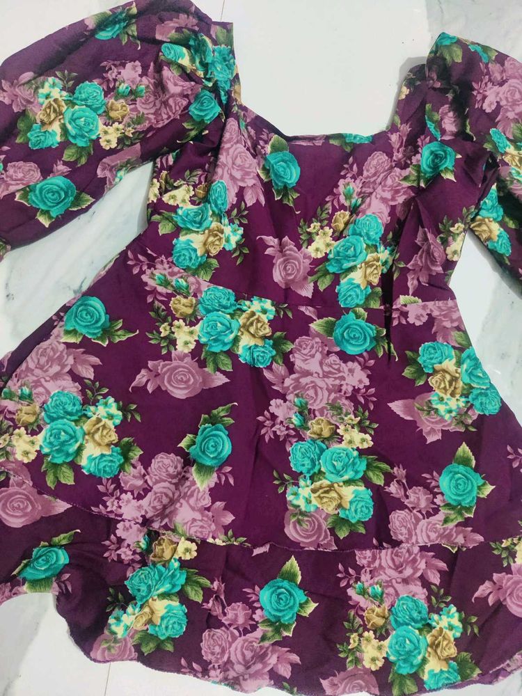 very pretty floral dress for casual or party wear.