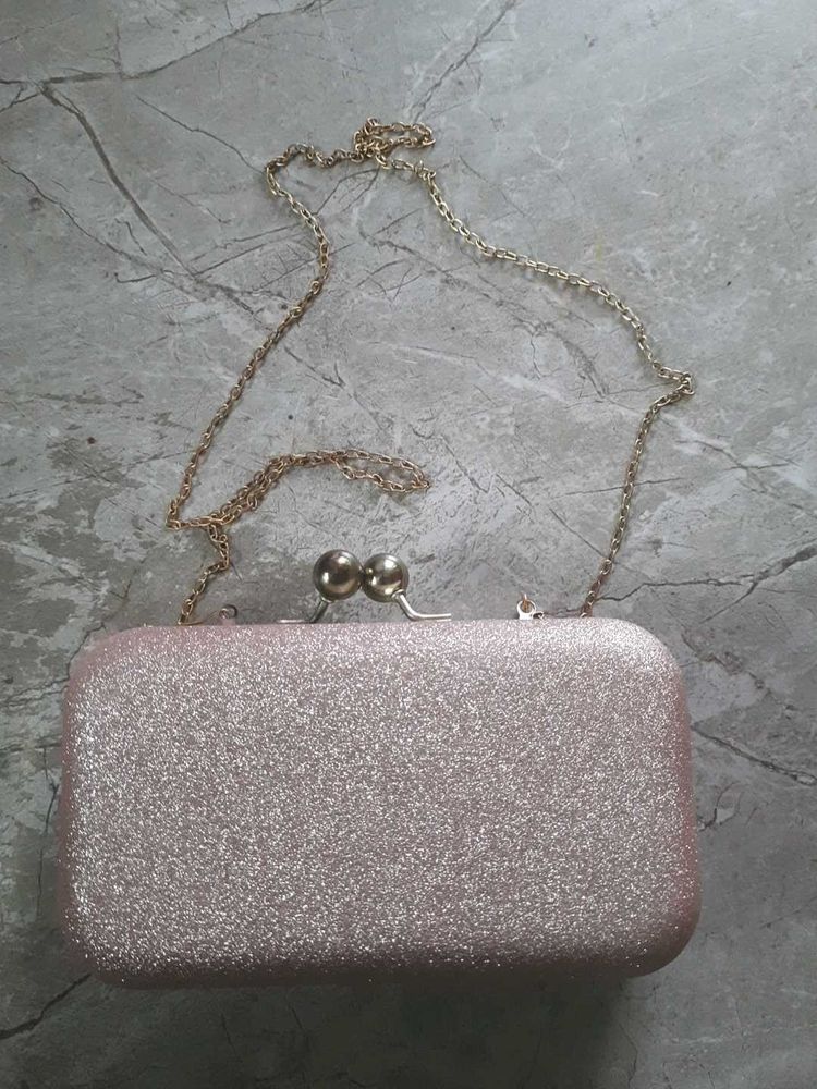 Beautiful peach color clutch