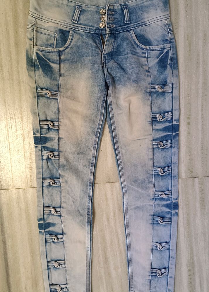 Designer jeans with multiple buttons