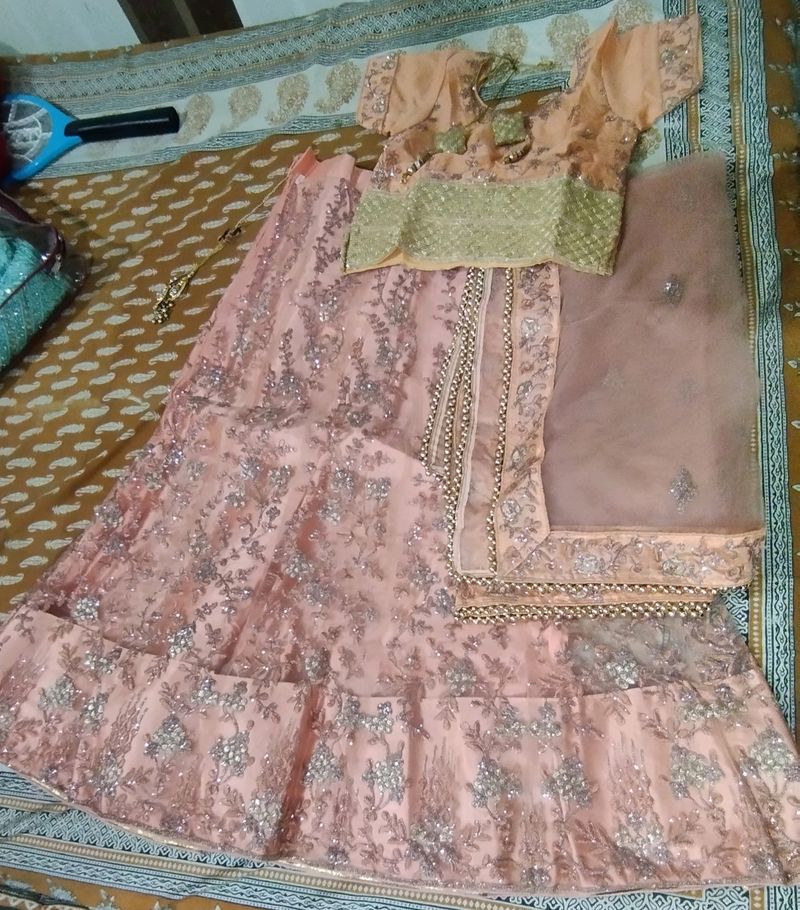 Bridal Lenhga With Choli & Dupatta.... Net Dupatta