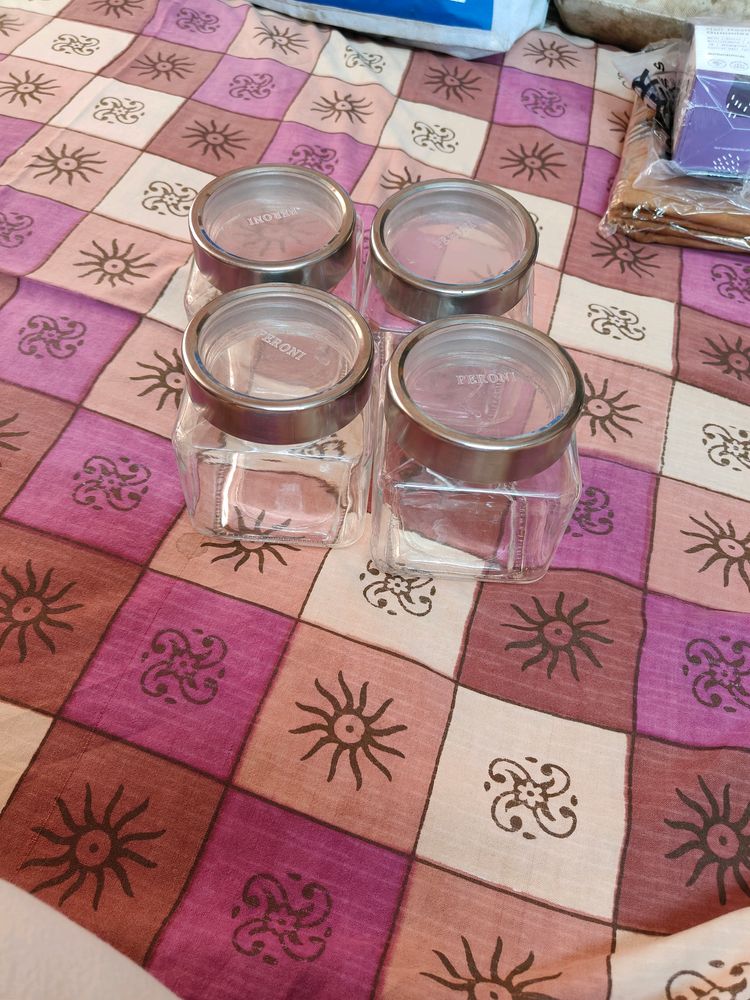 Four Pcs Glass Jars