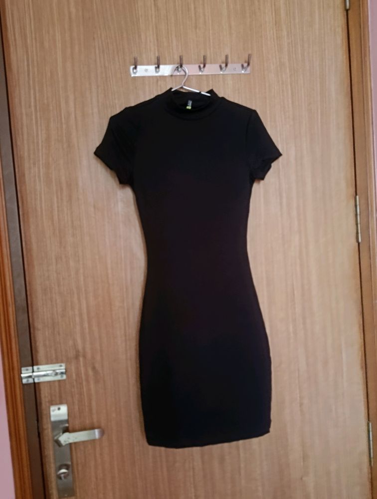 A Black Body Con Dress