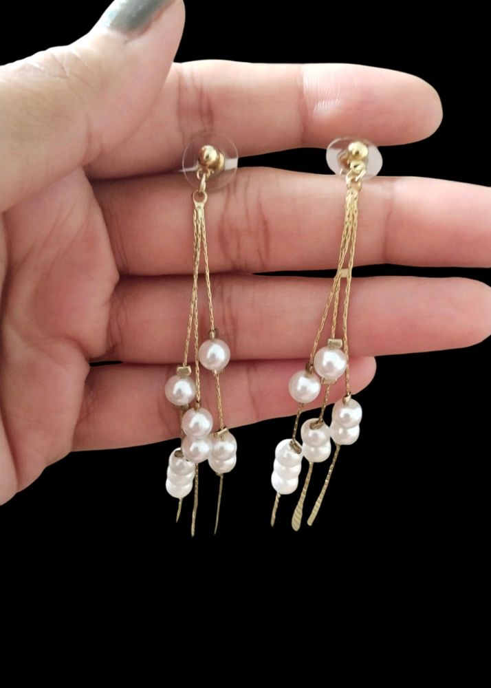 Long White Earrings.